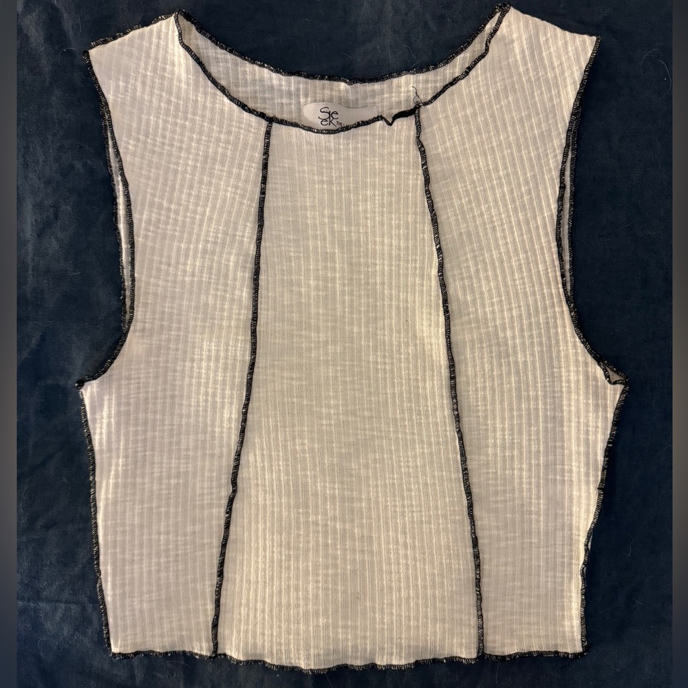 White Sleeveless Top with Black Trim